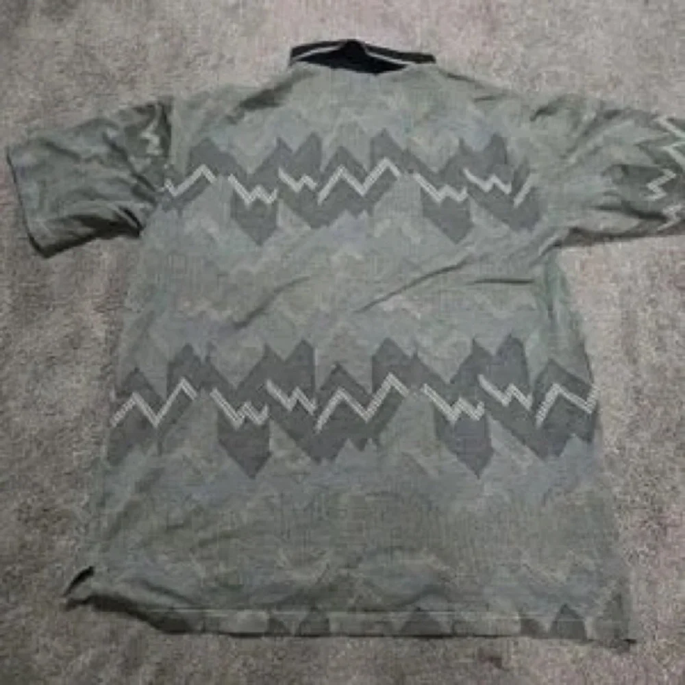 Kids Green Patterned Polo Shirt with Black Collar - Picture 7 of 7